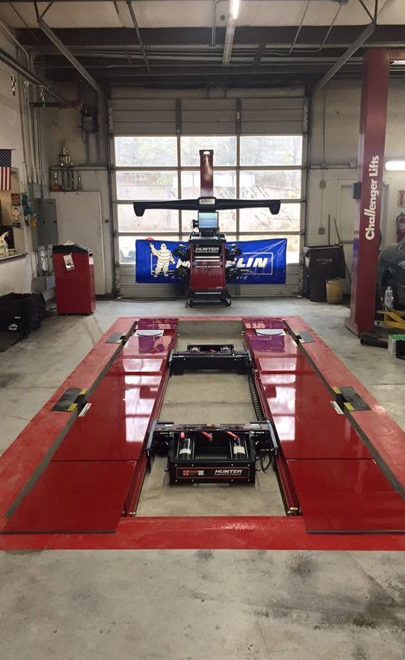 Service bay and lift at Alan Cox Premier Auto Care in Marietta
